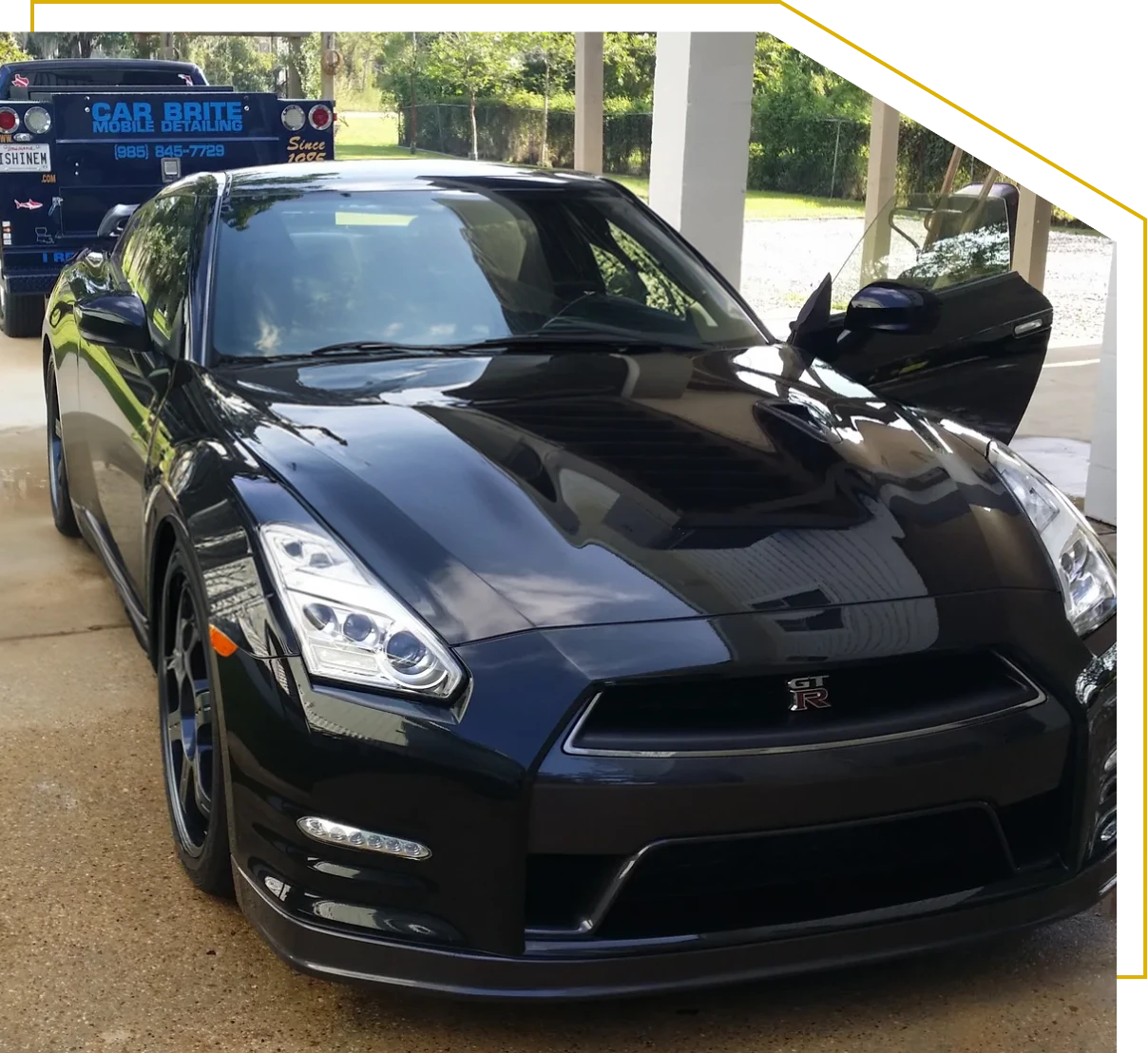 Sleek black vehicle under sunlight